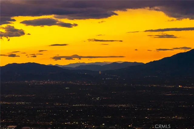 a view of mountains and valleys