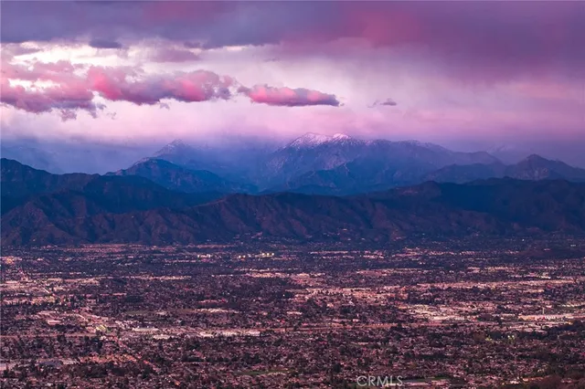 a view of swimming pool a and a fire pit