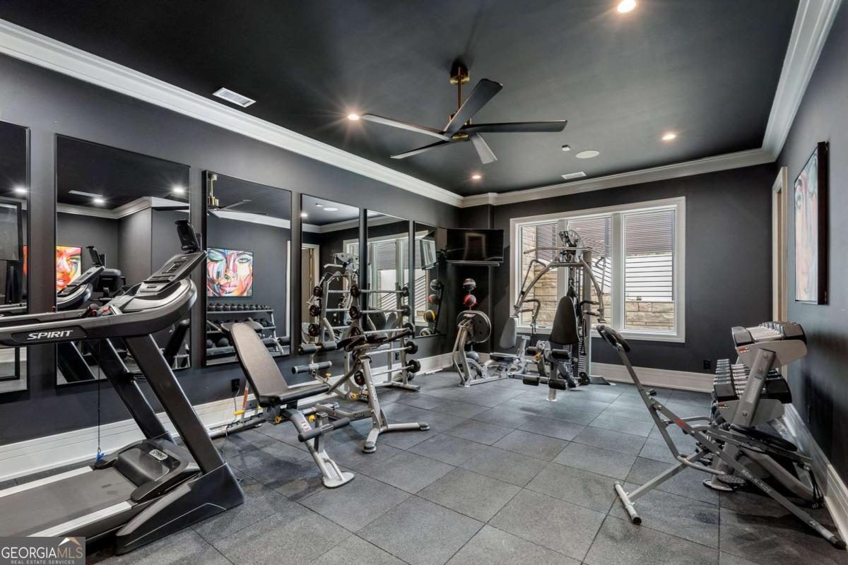 1386 Moores Mill Road Northwest Atlanta, GA 30327 - Photo 32 of 58 a view of a room with gym equipment