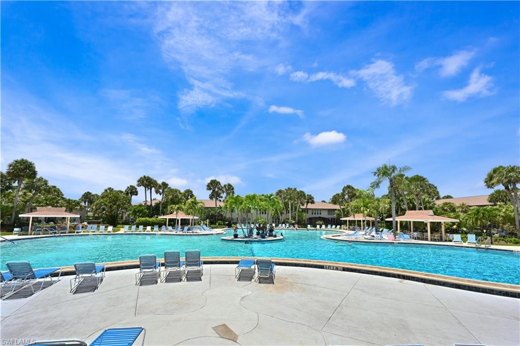 4031 Ice Castle Way, Unit 3306 Naples, FL 34112 - Photo 24 of 25 Community pool featuring a gazebo and a patio