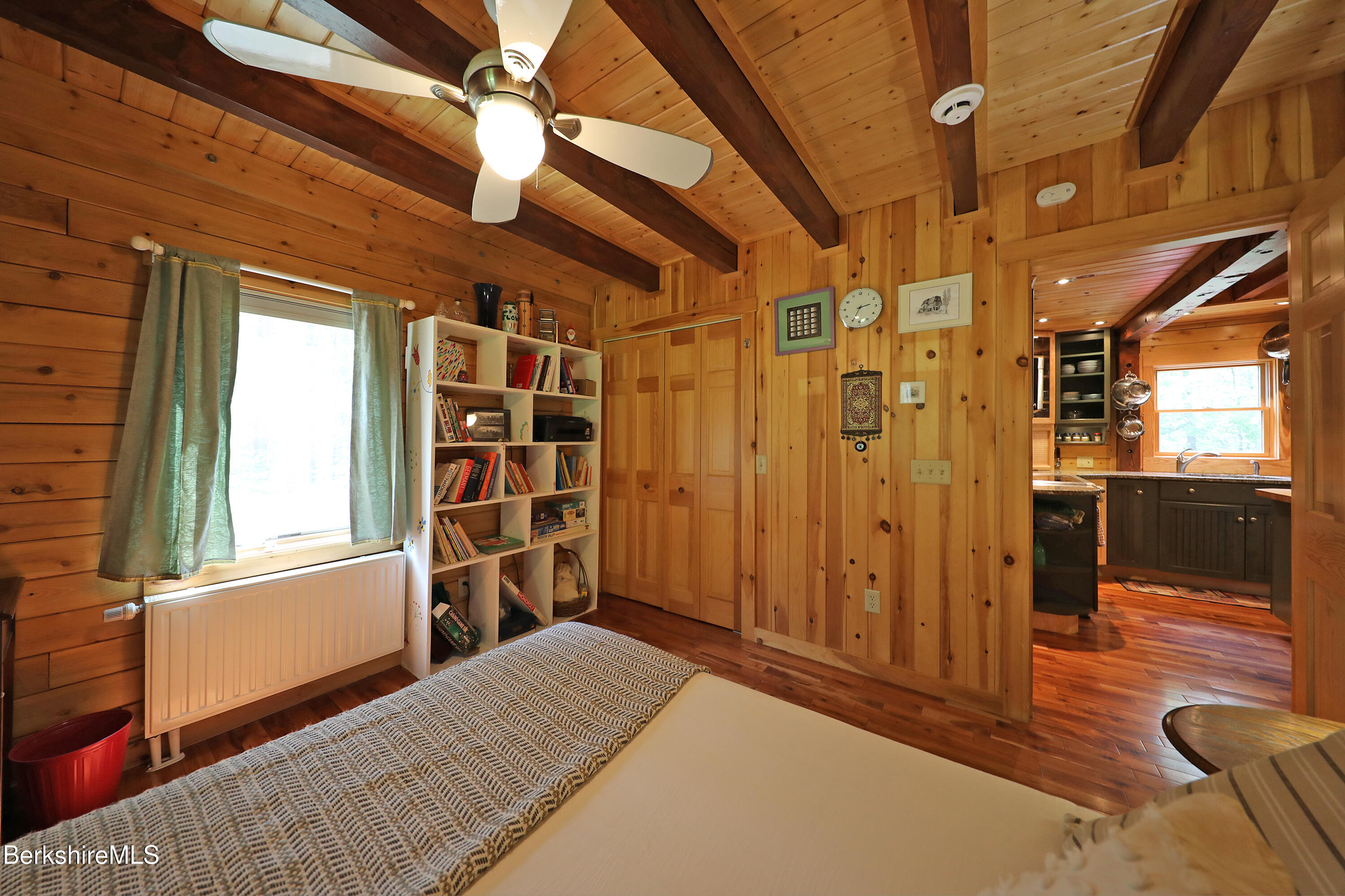 235 Algerie Road Becket, MA 01223 - Photo 14 of 43 a view of a porch with wooden floor and furniture