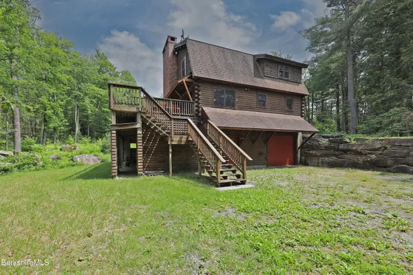 a view of a house with a park