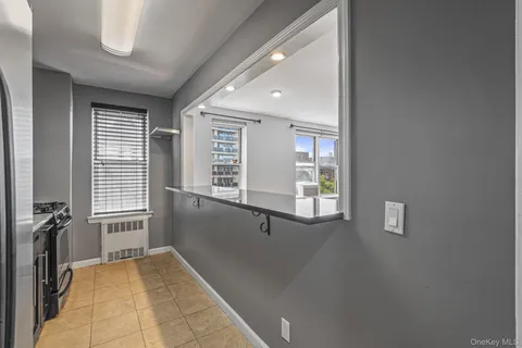 a view of empty room with windows