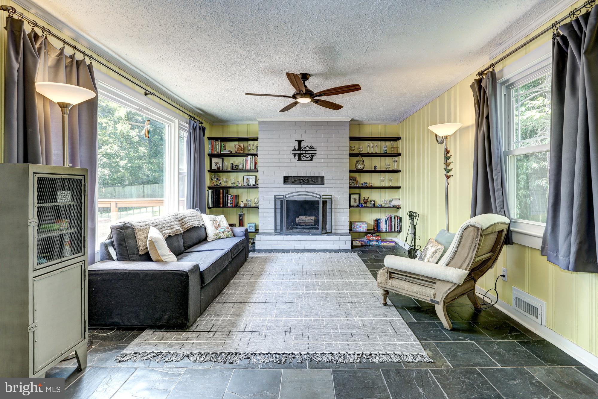 15400 Layhill Road Silver Spring, MD 20906 - Photo 10 of 42 Family rm w pic window, slate & fireplace (2!)