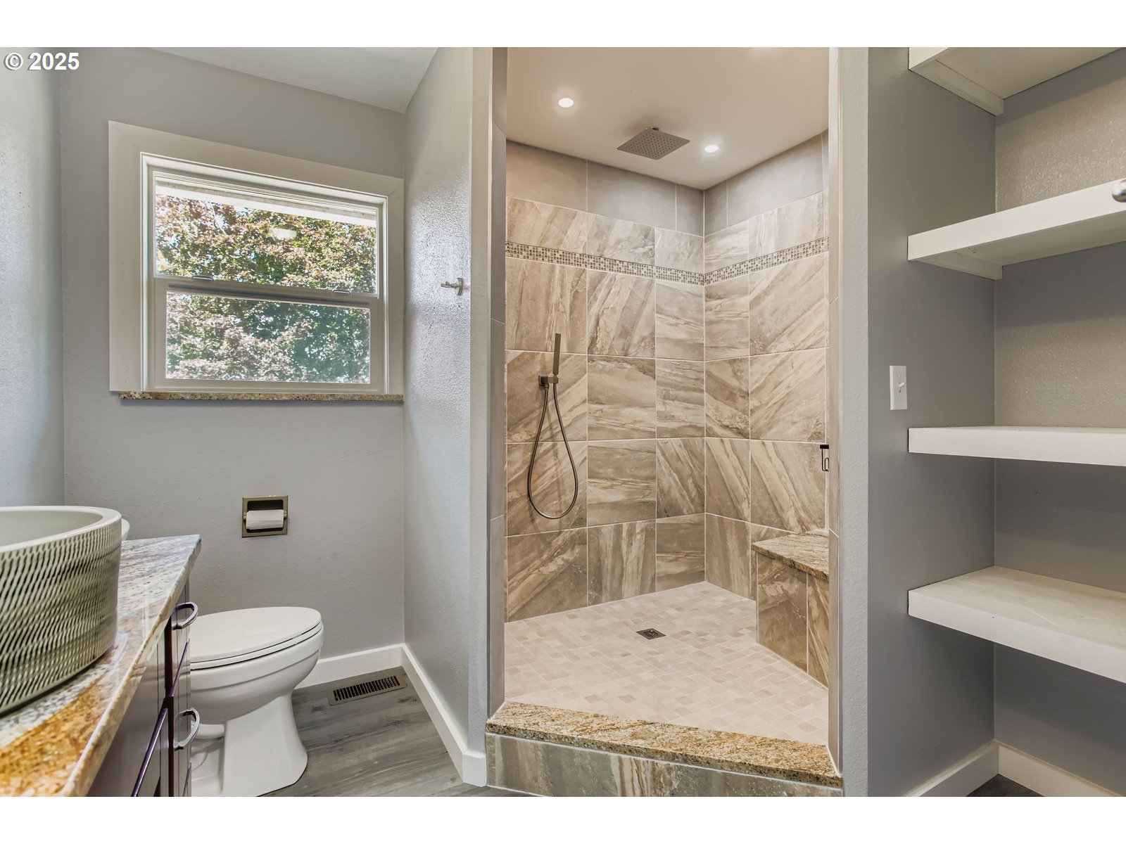 14555 Northeast Knott Court Portland, OR 97230 - Photo 14 of 40 a bathroom with a toilet and a shower