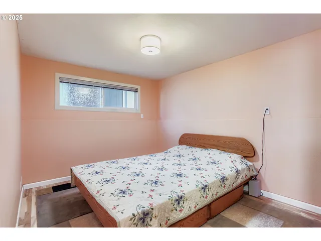 a bathroom with a granite countertop sink mirror and shower
