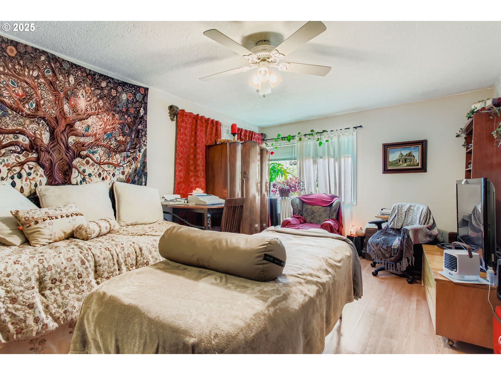 14555 Northeast Knott Court Portland, OR 97230 - Photo 30 of 40 a bedroom with furniture and a large mirror