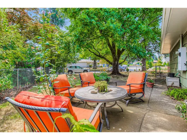 a view of a backyard of the house