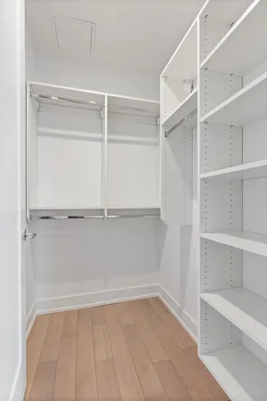 a view of an empty walk in closet
