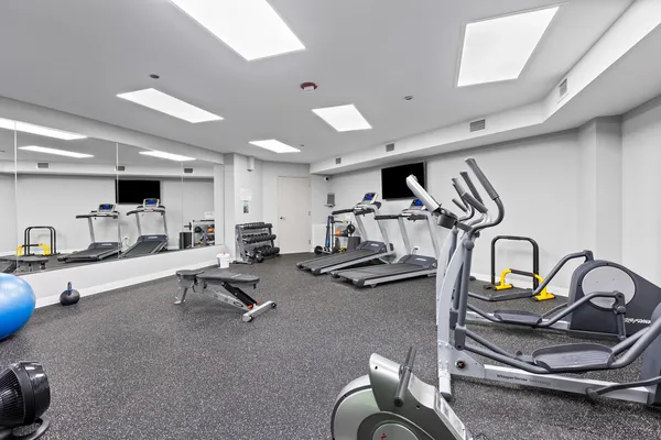 a view of a room with gym equipment