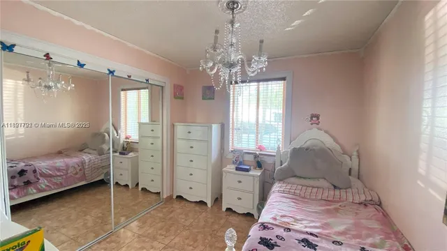 a kitchen with a sink stove top oven and cabinets