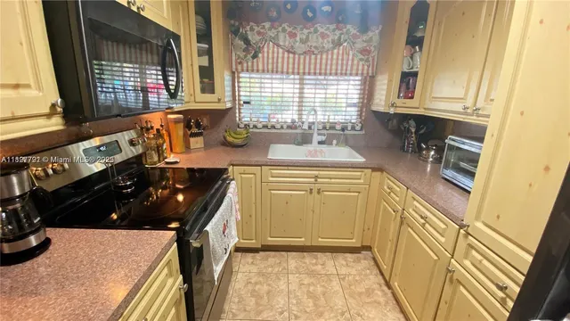 a living room with furniture and a large mirror