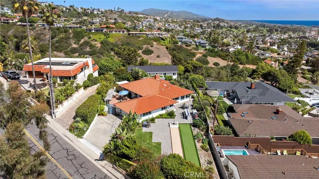 an aerial view of a house with a garden