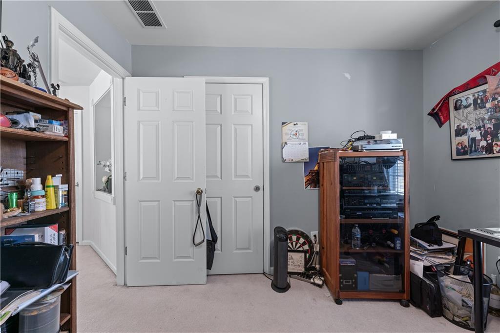 135 Splinter Court Suwanee, GA 30024 - Photo 28 of 47 a view of walk in closet