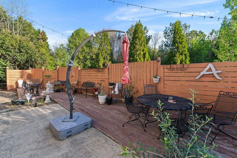 135 Splinter Court Suwanee, GA 30024 - Photo 37 of 47 a view of a chairs and table in the patio