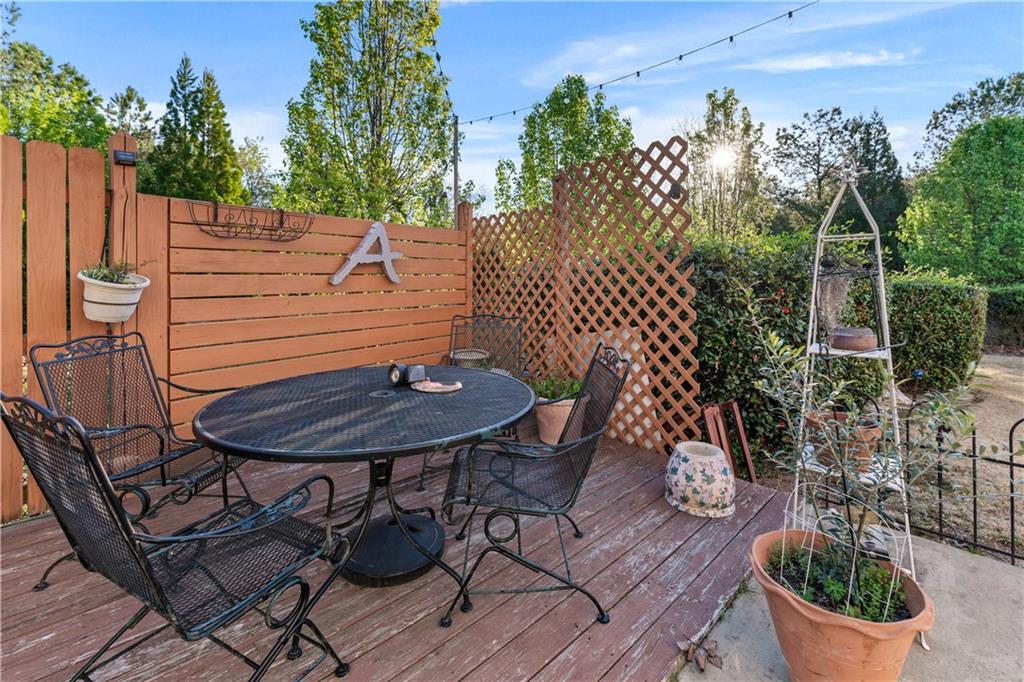 135 Splinter Court Suwanee, GA 30024 - Photo 38 of 47 a view of a table and chairs in patio