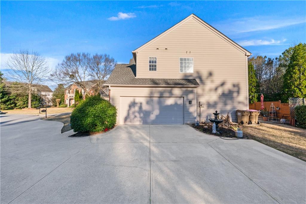 135 Splinter Court Suwanee, GA 30024 - Photo 40 of 47 a view of a house with a outdoor space
