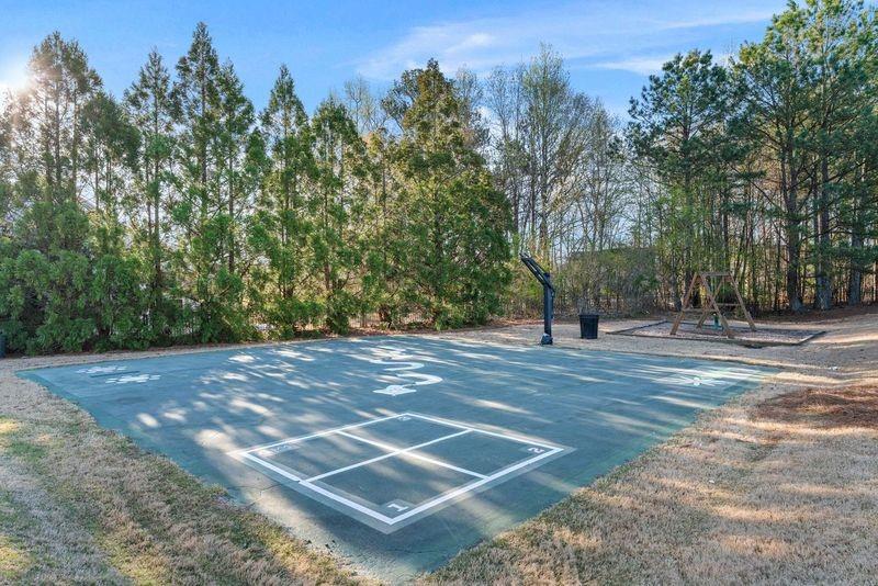 135 Splinter Court Suwanee, GA 30024 - Photo 46 of 47 a view of a tennis court