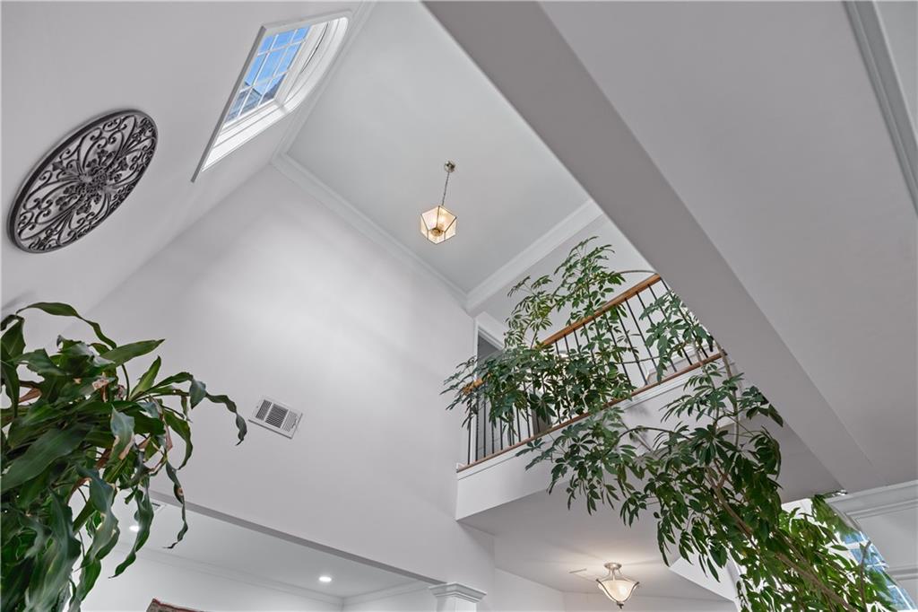 135 Splinter Court Suwanee, GA 30024 - Photo 5 of 47 a view of entryway with flower plant