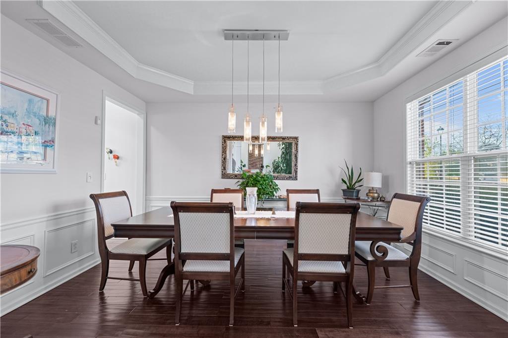 135 Splinter Court Suwanee, GA 30024 - Photo 6 of 47 a view of a dining room with furniture window and wooden floor