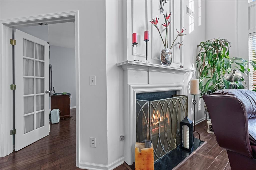 135 Splinter Court Suwanee, GA 30024 - Photo 10 of 47 a view of a entryway with wooden floor and stairs