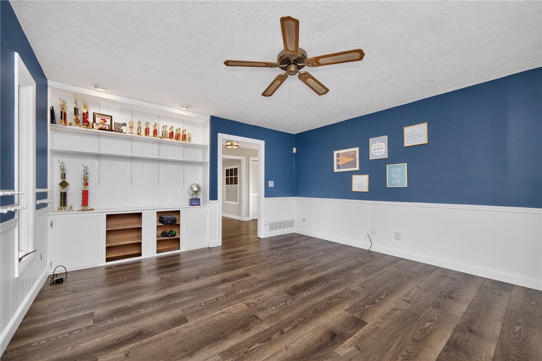 4747 Fawnwood Road Dayton, OH 45429 - Photo 24 of 58 This inviting space features durable flooring and built-in shelving, perfect for comfortable living.