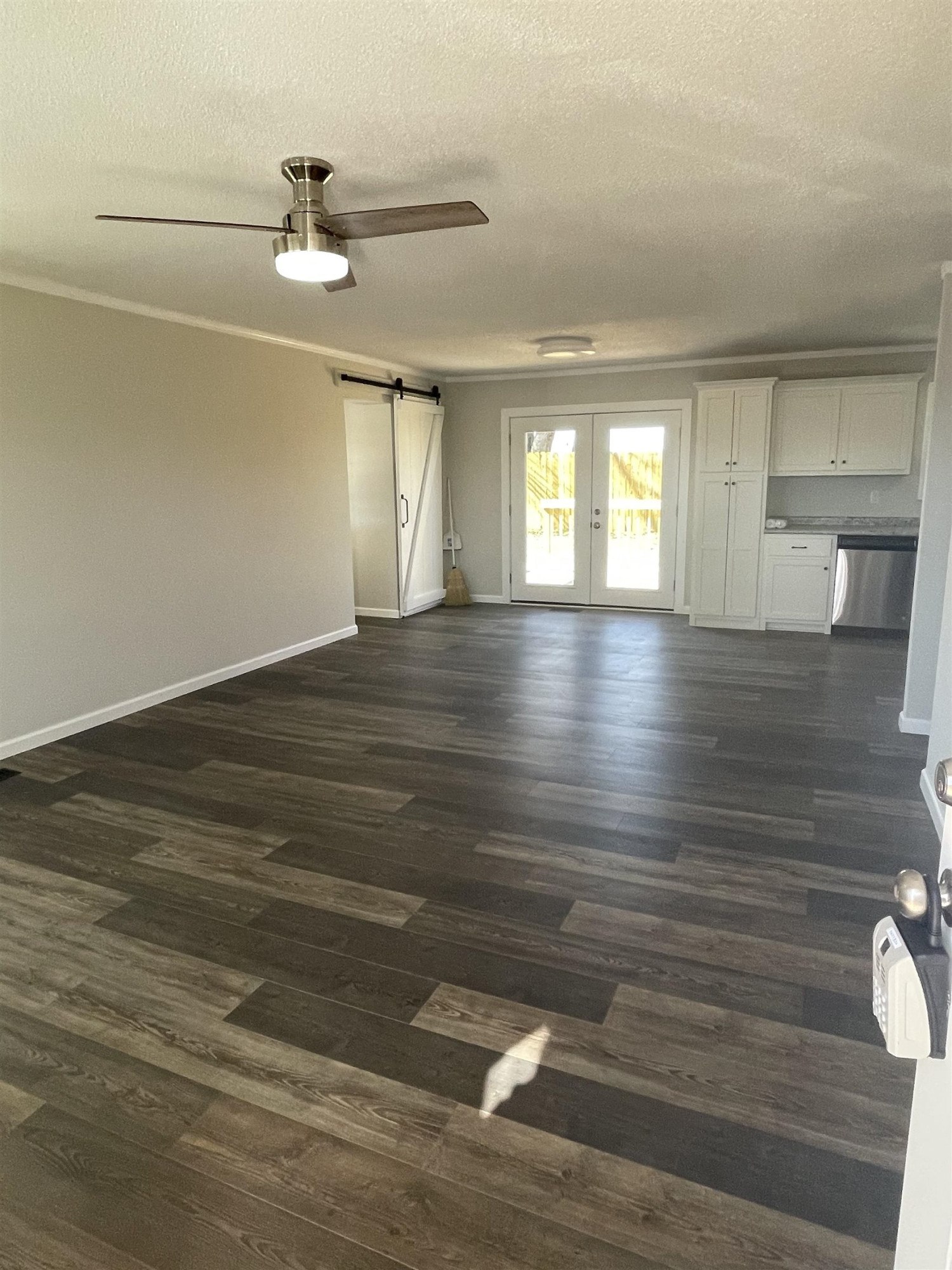 5677 Tatumville Road Newbern, TN 38059 - Photo 2 of 16 a view of empty room with wooden floor
