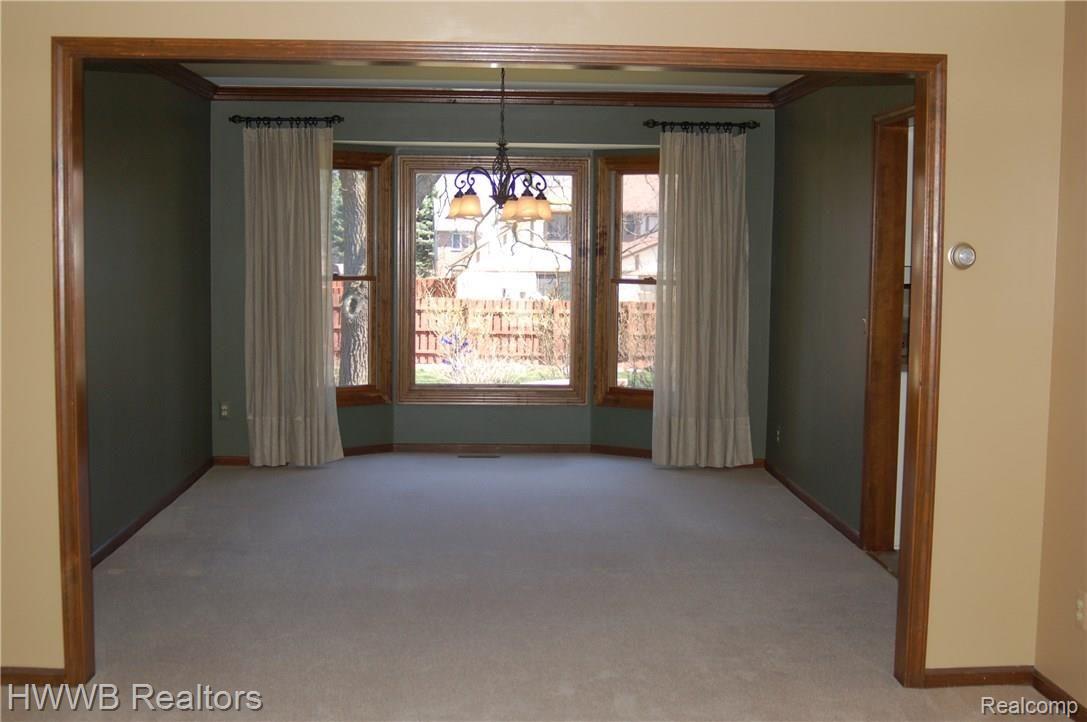 564 Sunlight Drive Rochester, MI 48309 - Photo 13 of 47 Living Room to Dining Room