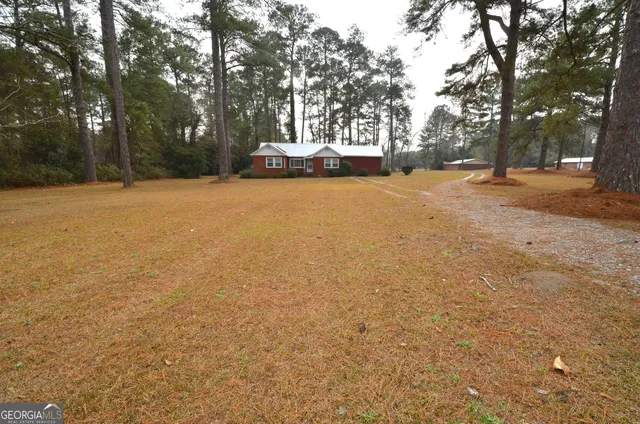 a view of road with trees
