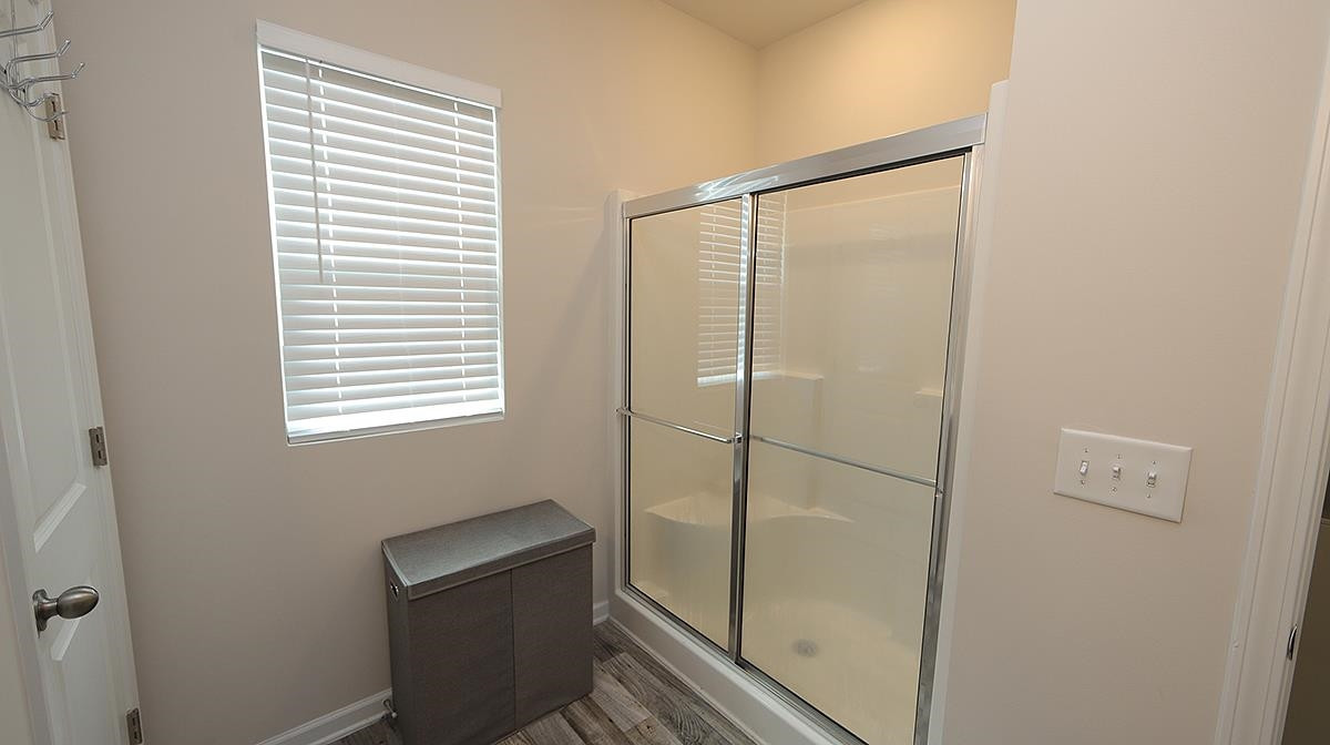 3705 Putman Road Raleigh, NC 27610 - Photo 15 of 19 This home has a oversized shower that allows you to enjoy the experience with comfort. Primary Bath