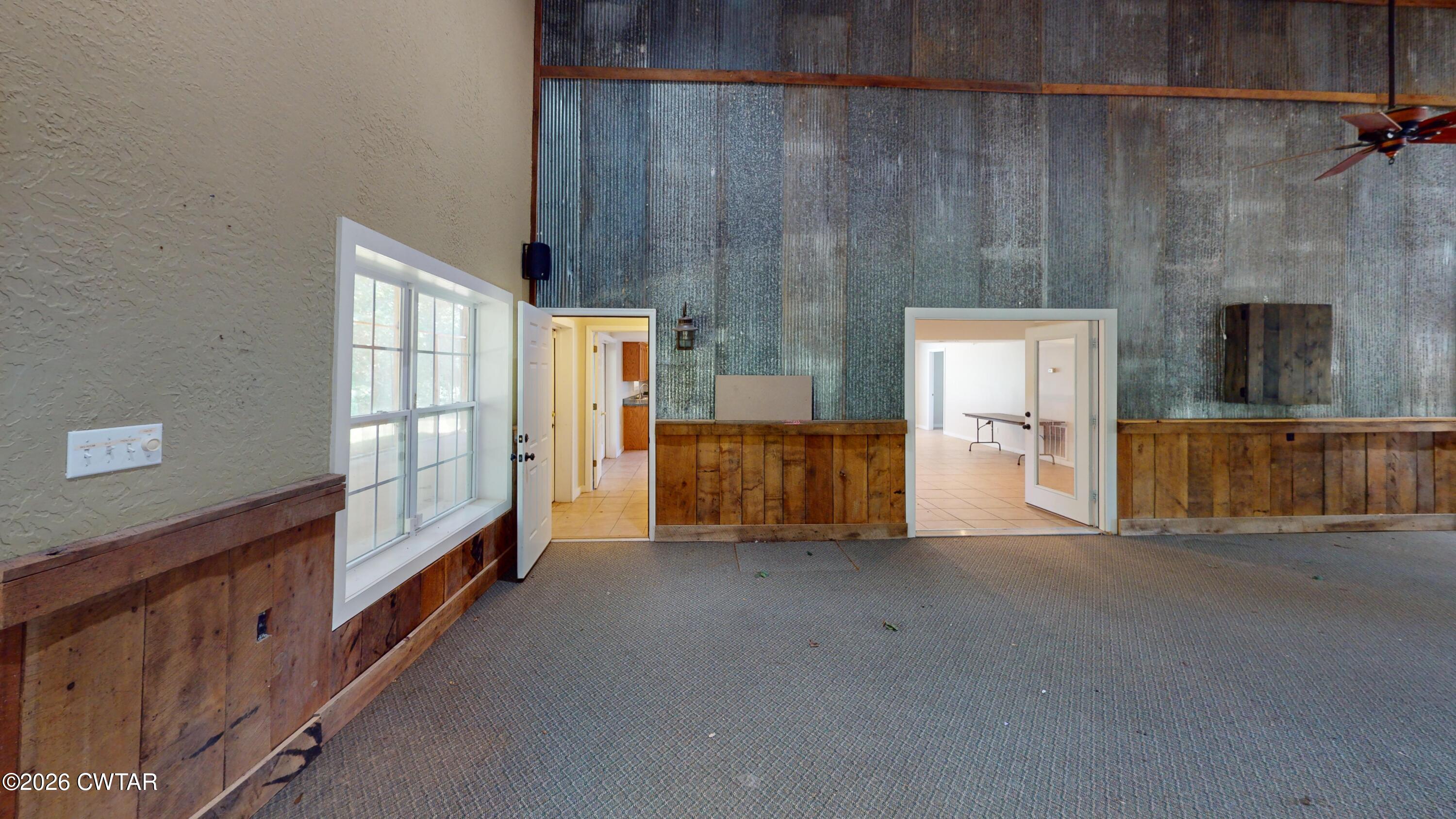 1532 Jackson Hill Road Hornbeak, TN 38232 - Photo 11 of 50 a view of a hallway with windows