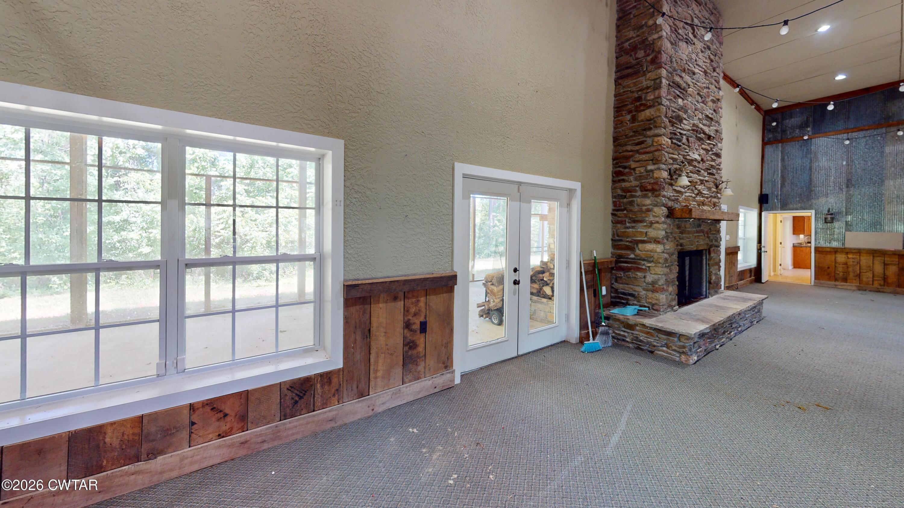 1532 Jackson Hill Road Hornbeak, TN 38232 - Photo 12 of 50 a living room with furniture and large windows