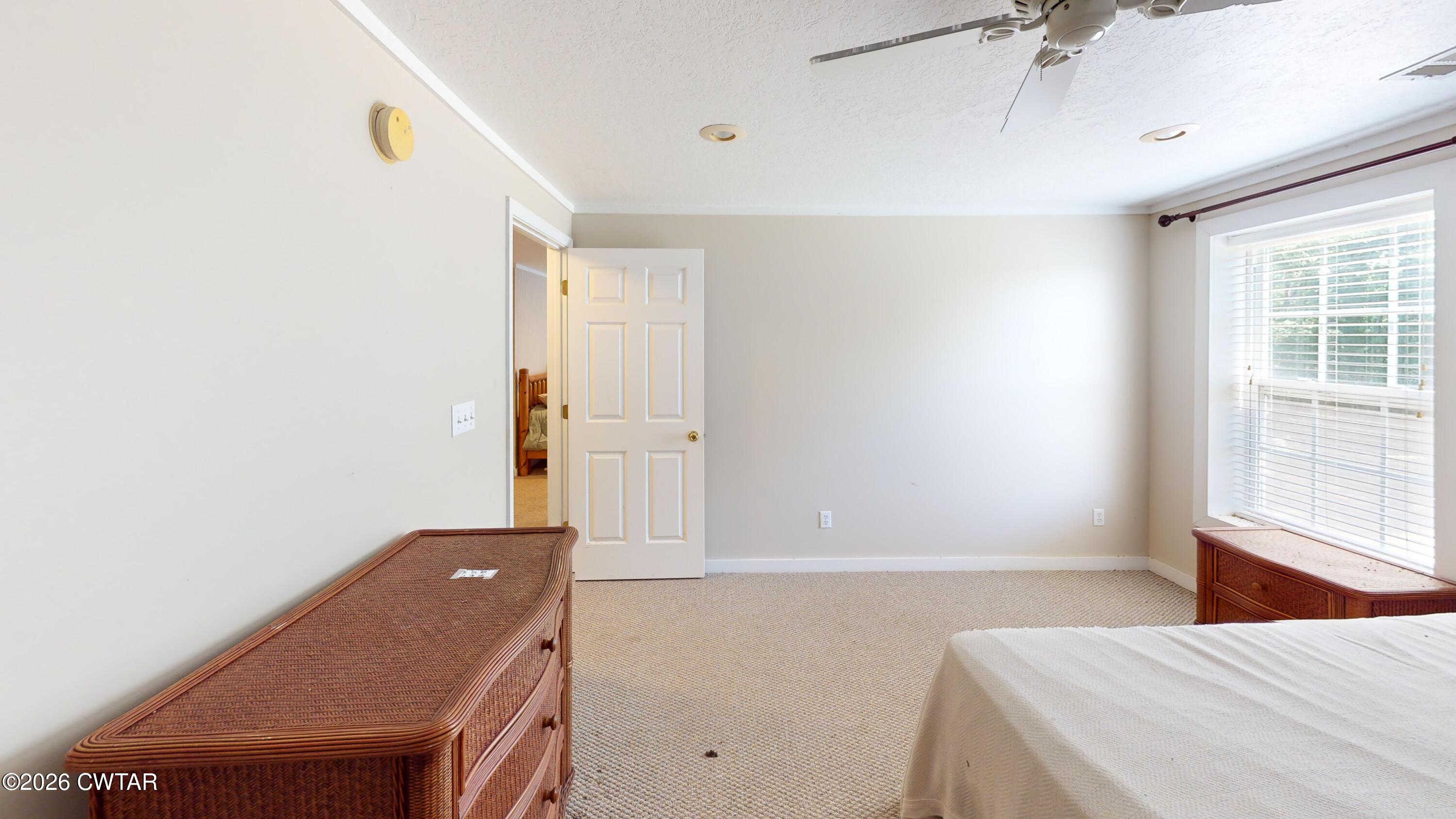 1532 Jackson Hill Road Hornbeak, TN 38232 - Photo 29 of 50 a room with window and a table