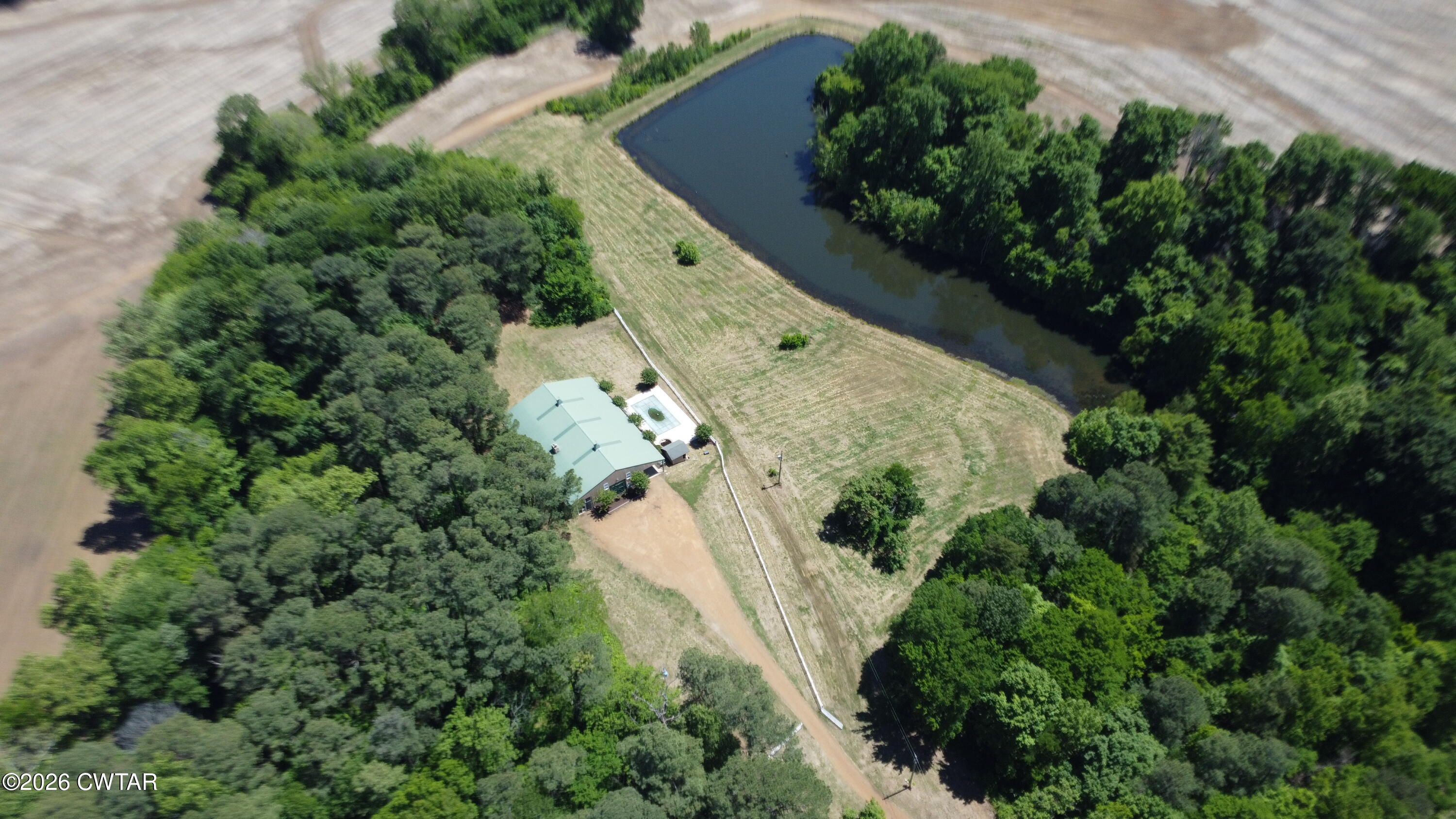 1532 Jackson Hill Road Hornbeak, TN 38232 - Photo 38 of 50 an aerial view of a house with a yard