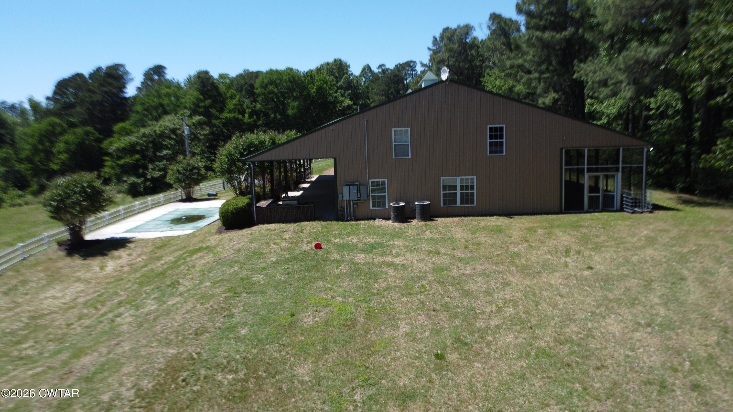 1532 Jackson Hill Road Hornbeak, TN 38232 - Photo 46 of 50 a house that has a tree in front of it