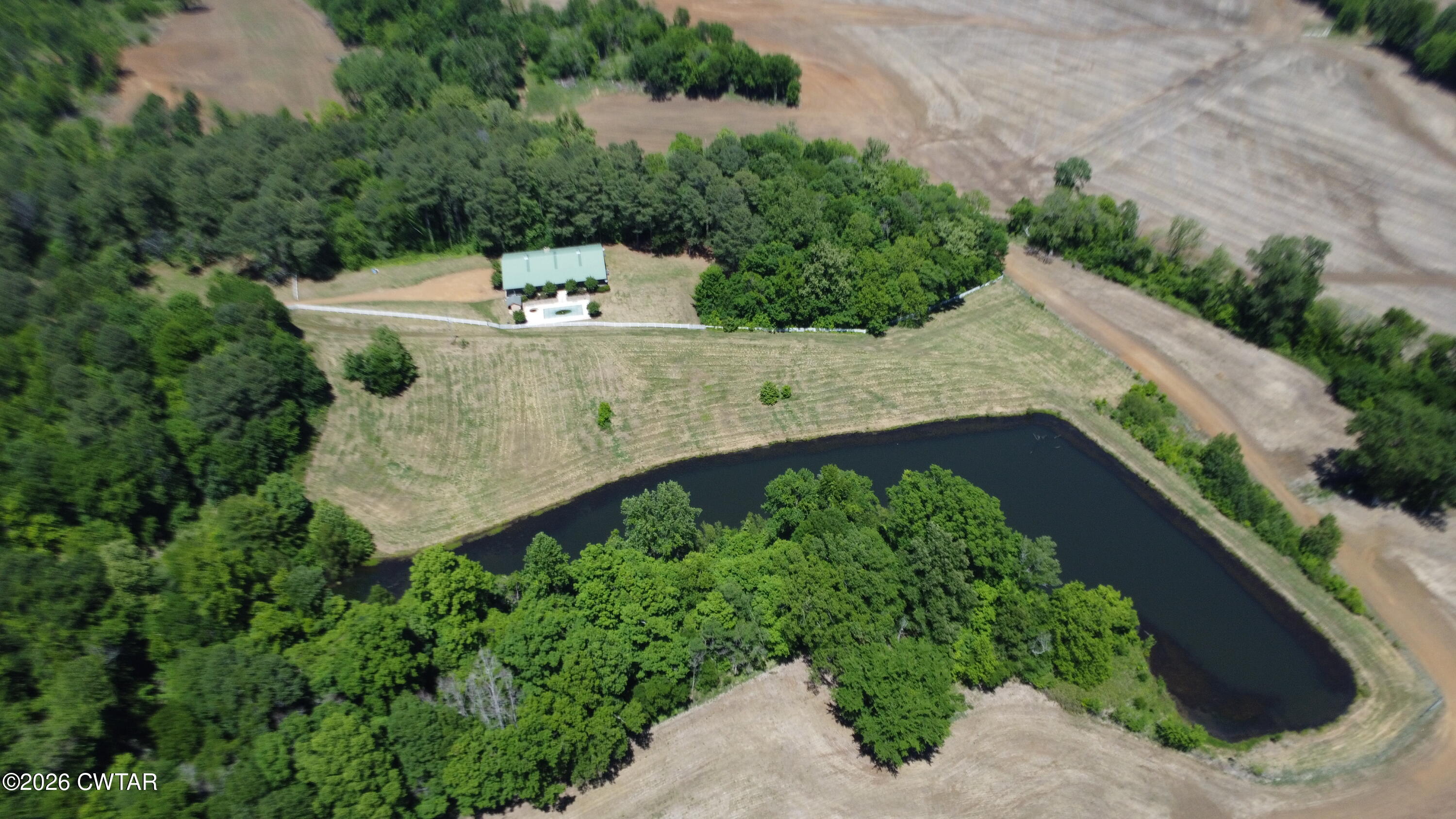 1532 Jackson Hill Road Hornbeak, TN 38232 - Photo 5 of 50 an aerial view of a house with a yard and lake view