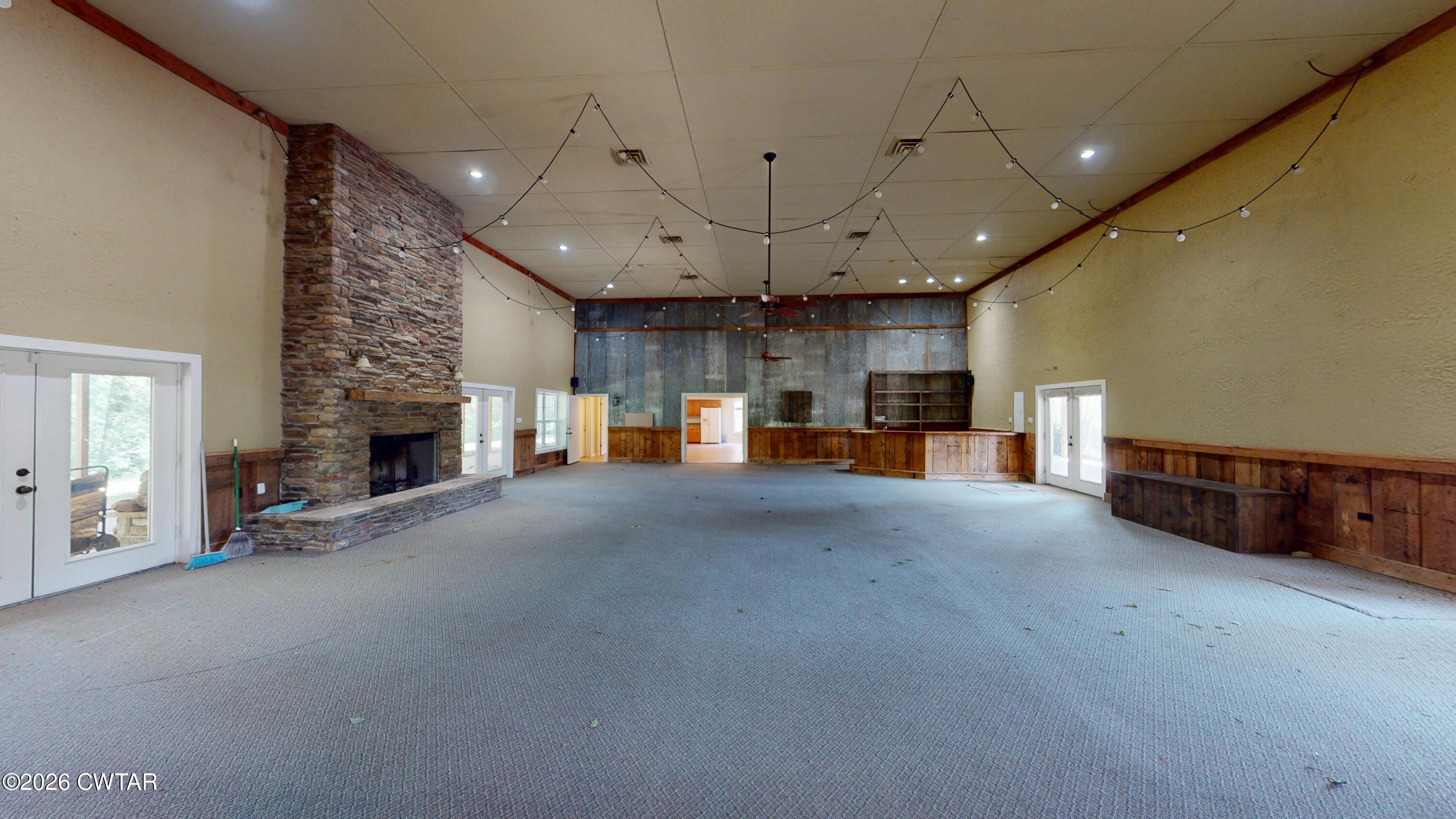 1532 Jackson Hill Road Hornbeak, TN 38232 - Photo 7 of 50 a view of a livingroom with furniture and a fireplace