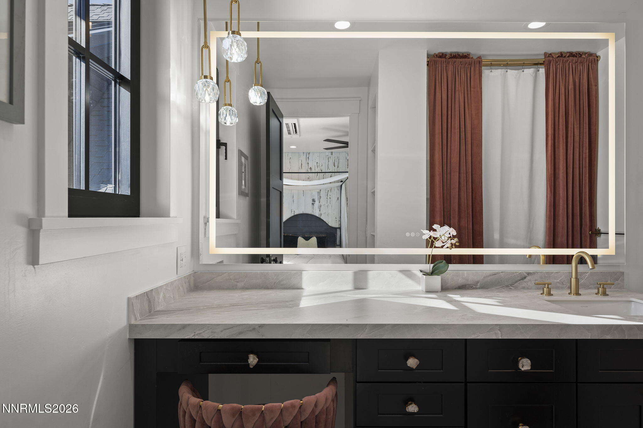 1426 Foothill Road Reno, NV 89511 - Photo 47 of 100 a bathroom with a sink and a mirror