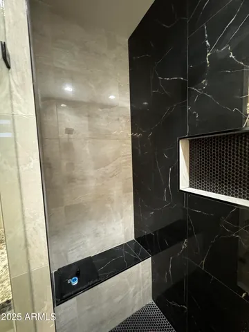 a bathroom with a mirror