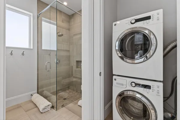 a view of a lake with houses in the back