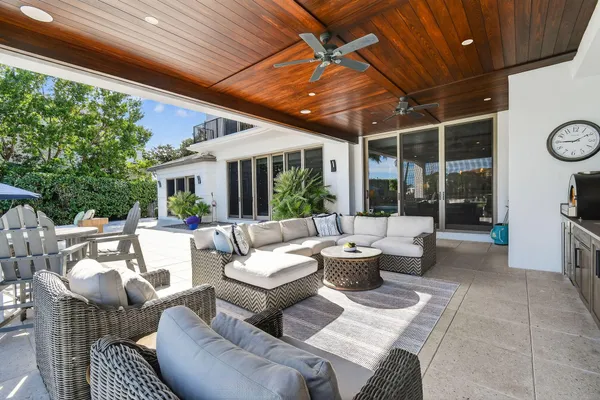 an aerial view of residential house with outdoor space and lake view