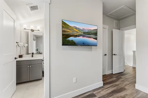 a view of a bathroom from a hallway