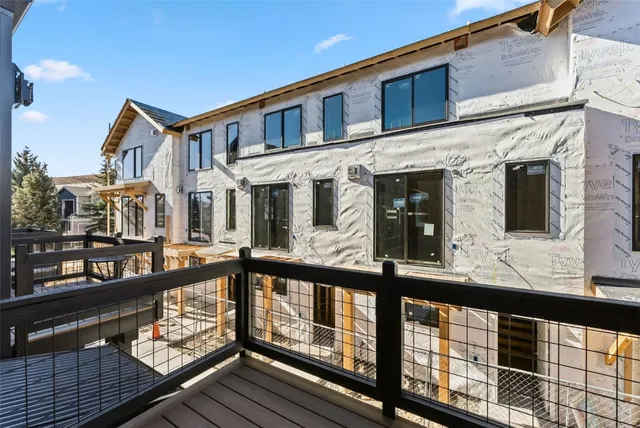a view of a street from a balcony