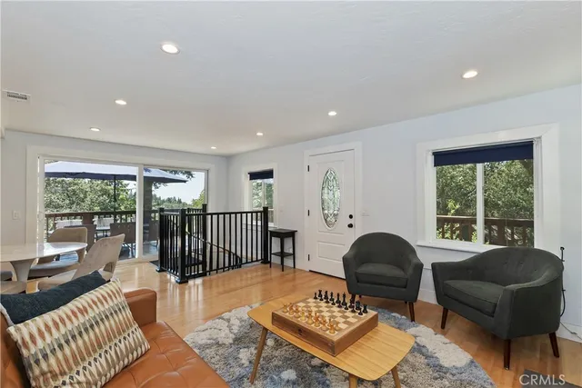 a kitchen with granite countertop a sink stove and cabinets