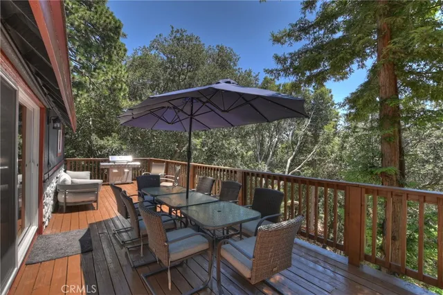 a view of porch with wooden floor