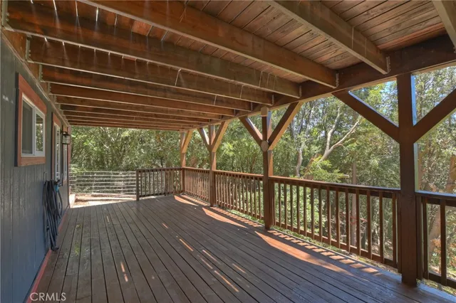 a view of a lush green hillside and a building