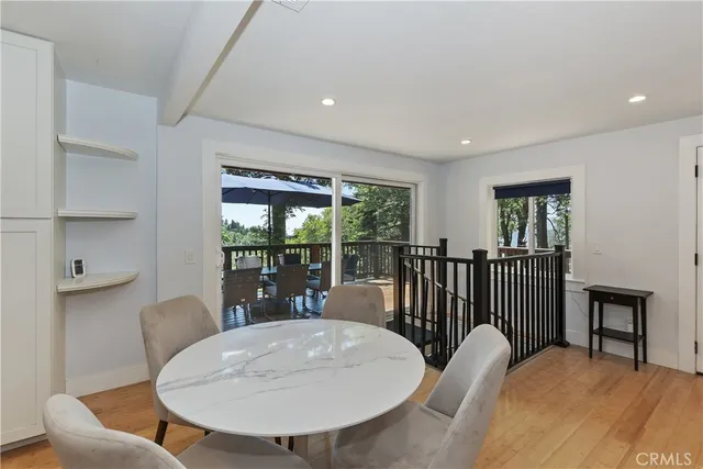 a kitchen with a sink stove top oven and cabinets