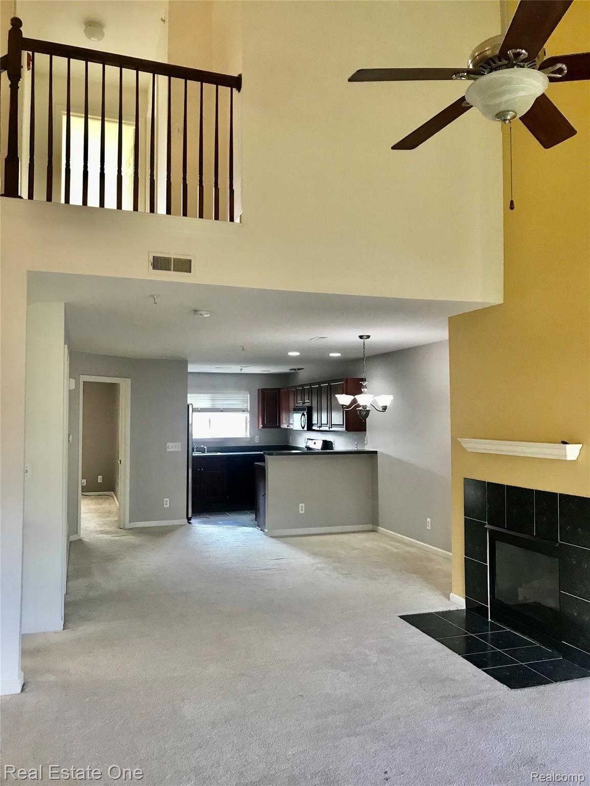 16918 Farmington Road Livonia, MI 48154 - Photo 7 of 21 BRIDGE OVERLOOKING GREAT RM WITH VAULTED CEILINGS