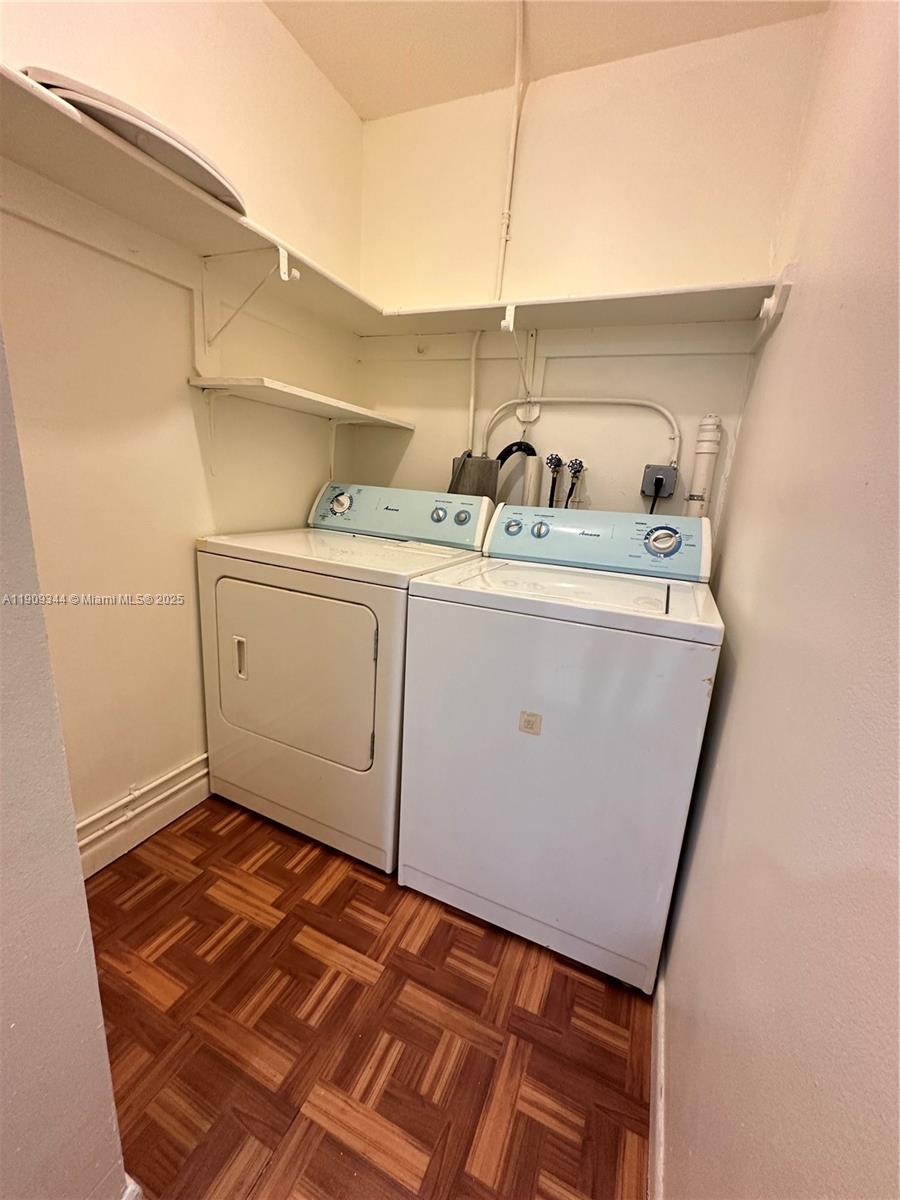 1555 West 44th Place, Unit 234 Hialeah, FL 33012 - Photo 35 of 38 a utility room with dryer and washer