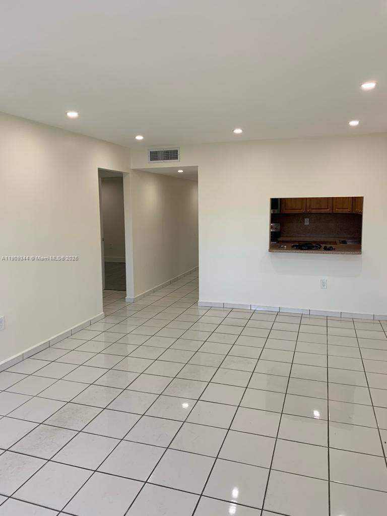 1555 West 44th Place, Unit 234 Hialeah, FL 33012 - Photo 9 of 38 a view of an empty room